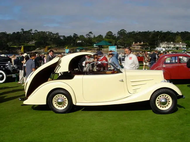 El Peugeot 401 Eclipse haciendo gala de su capota r&iacute;gida y el&eacute;ctrica