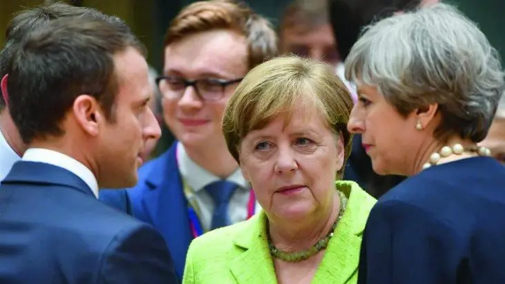 Emmanuel Macron, presidente de Francia; Angela Merkel, canciller alemana y Theresa May, primera ministra brit&aacute;nica.  The Asian Age