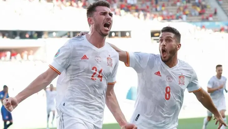 Laporte y Koke celebran a lo grande. uefa.com