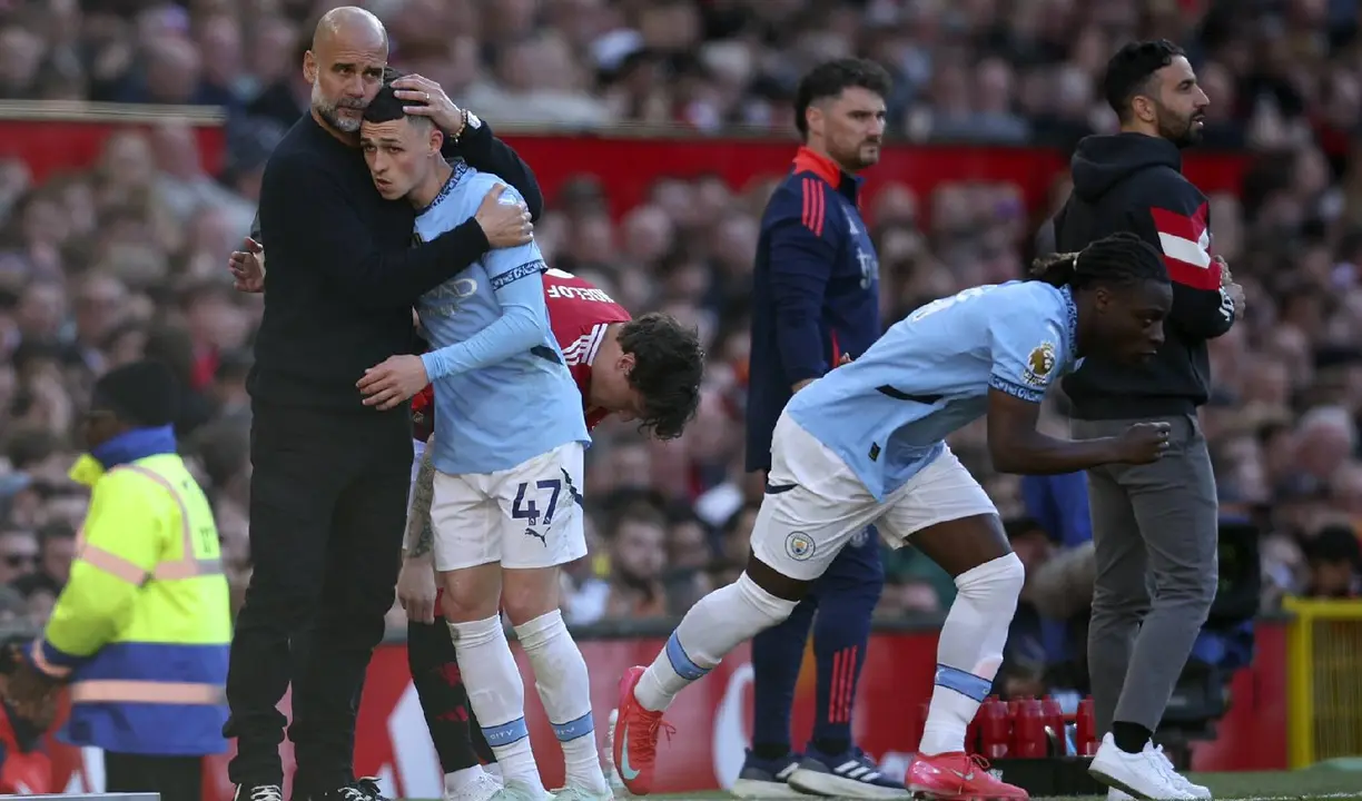 Pep Guardiola y Phil Foden. /   @philfoden