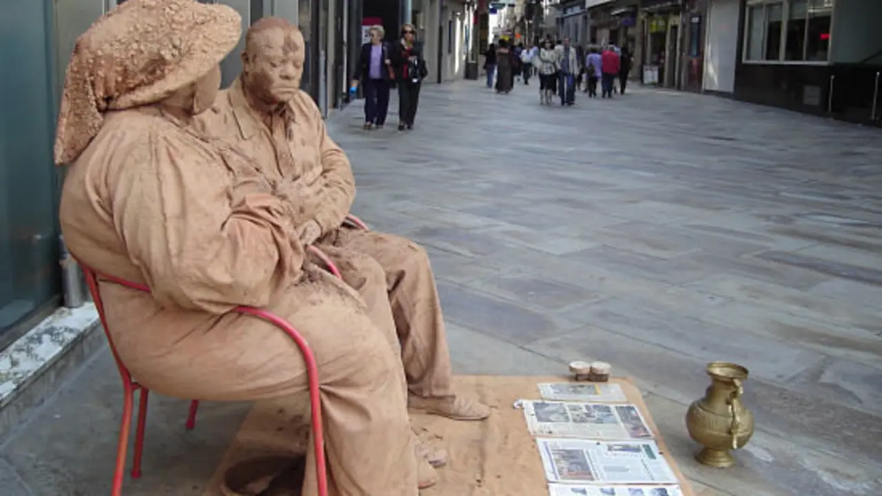 Marisa Donnizzete Benedicto y Valdir de Oliveira Martinez,  de Brasil - Estatuas de barro - Francisco Pu&ntilde;al