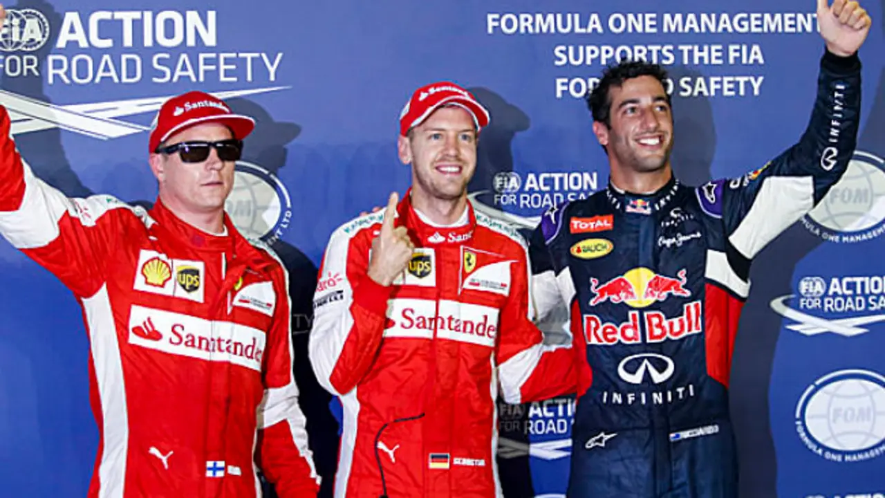 Marina Bay Circuit, Singapore.Saturday 19 September 2015.Top three qualifiers, Kimi Raikkonen, Ferrari, Sebastian Vettel, Ferrari, and Daniel Ricciardo, Red Bull Racing. World Copyright: Steven Tee/LAT Photographic.ref: Digital Image _L4R0218