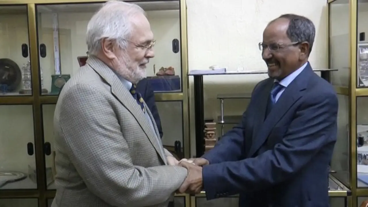 Mohamed Abdelaziz y Christopher Ross