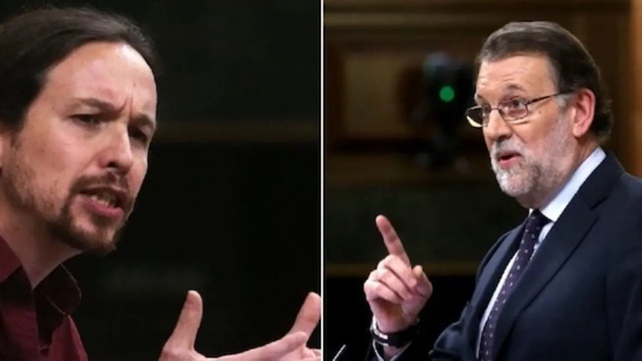 Pablo Iglesias y Mariano Rajoy durante la segunda sesión de investidura.