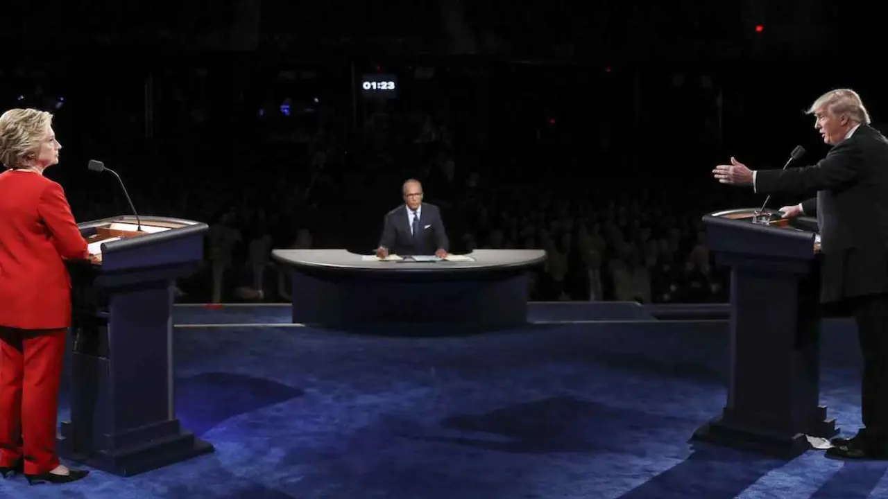 Hillary Clinton, Donald Trump y Lester Holt, moderador del debate. / TV CNN