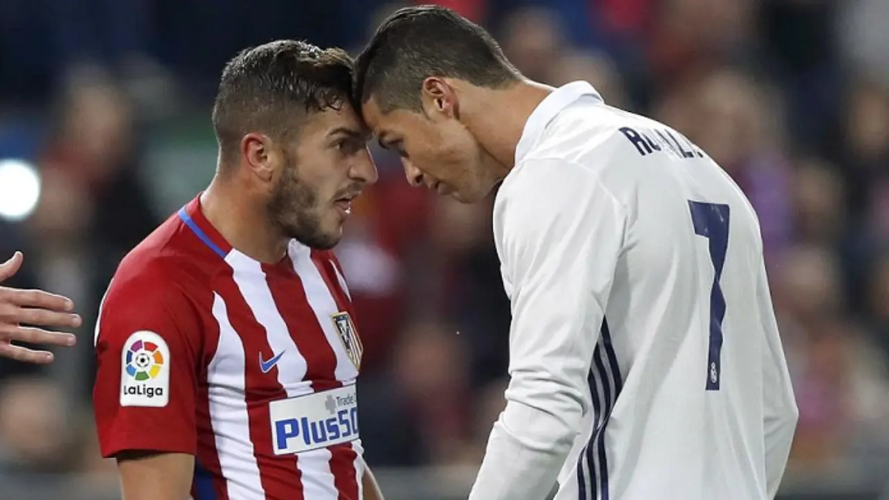 Koke y  Cristiano Ronaldo enfrentados.