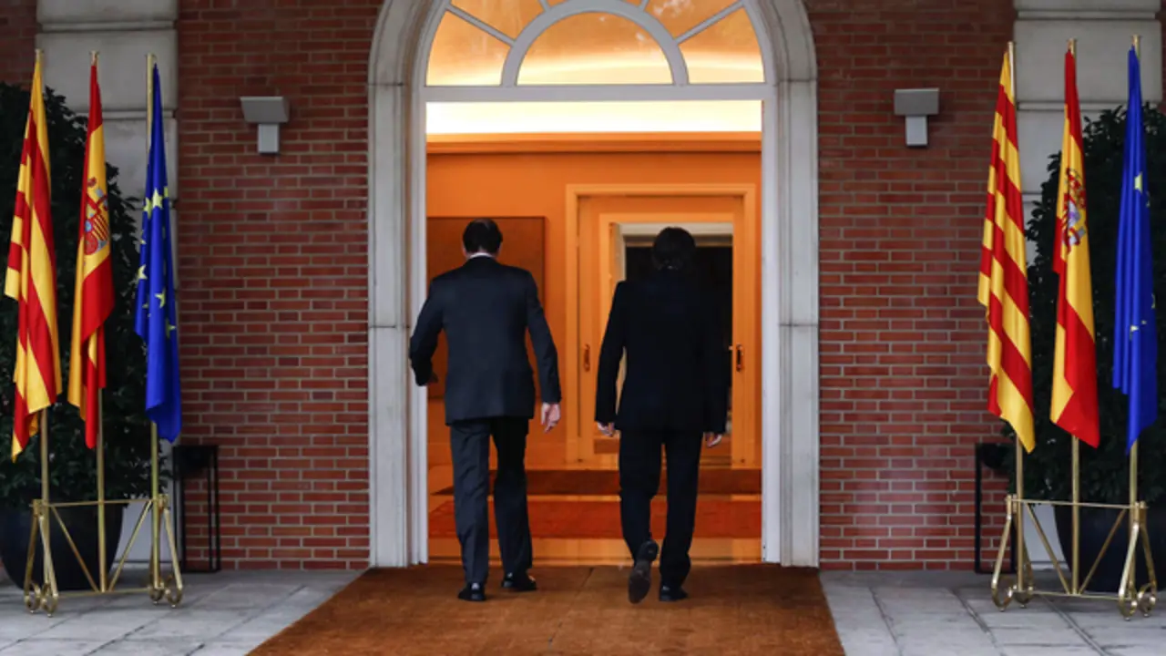 Mariano Rajoy y Carles Puigdemont