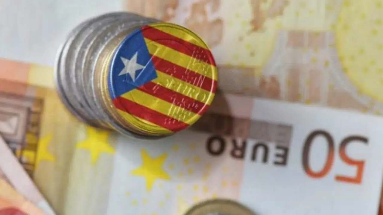 Moneda con la bandera de Catalu&ntilde;a. / Dreamstime