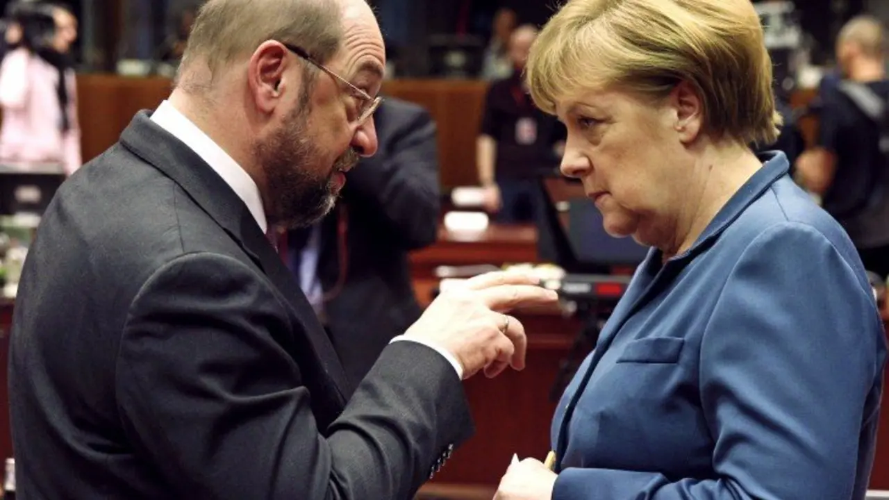 Martin Schulz, pol&iacute;tico alem&aacute;n; y Angela Merkel, canciller de Alemania. sbs.com.au