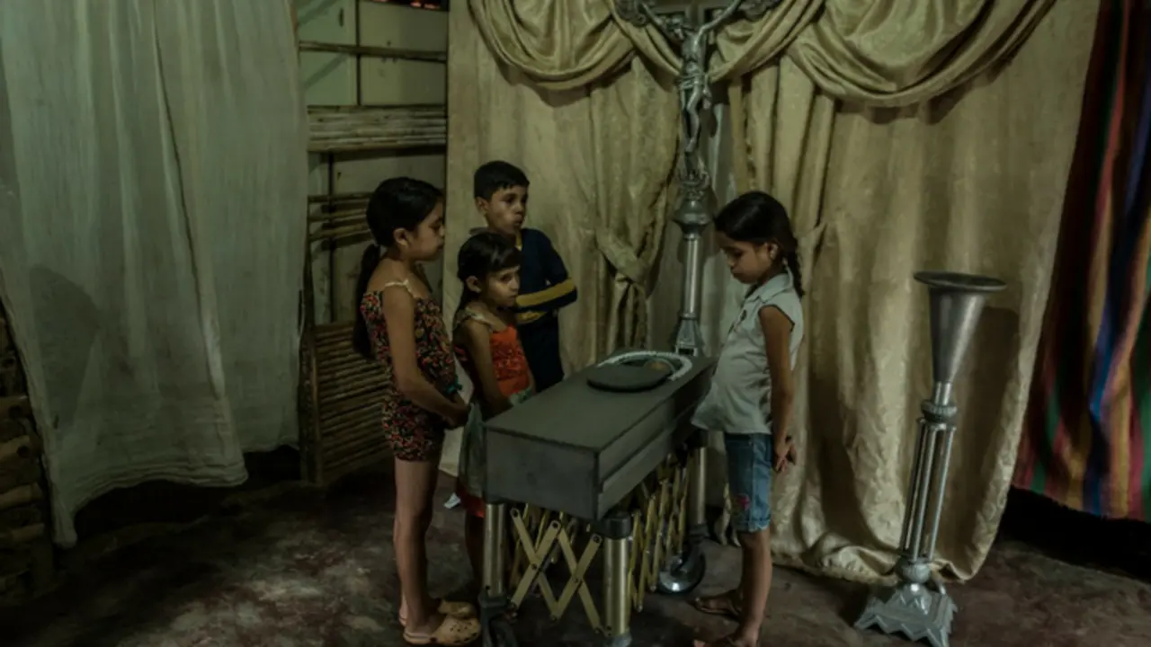 Velorio de un beb&eacute; desnutrido en Venezula. The New York Times.