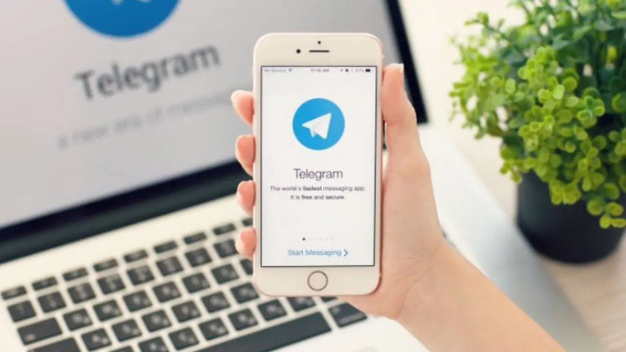 Telegram en el m&oacute;vil y laptop. / Hipertextual