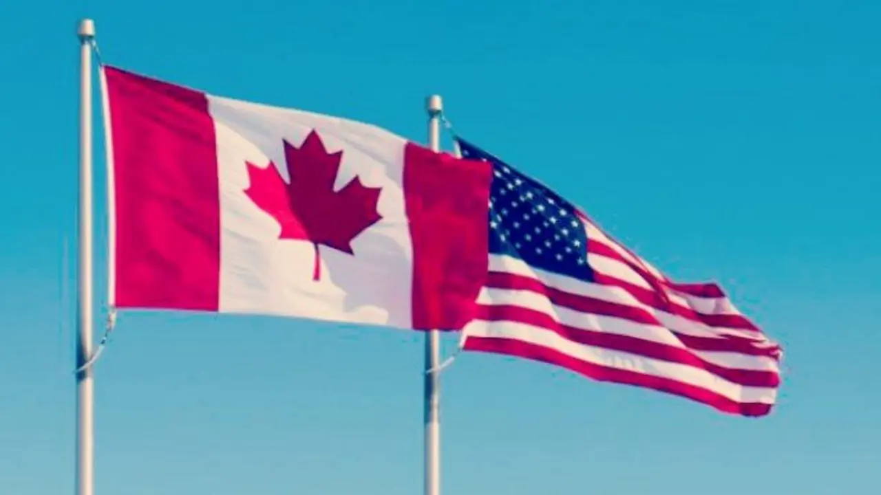 Banderas de Canad&aacute; y Estados Unidos. RR SS