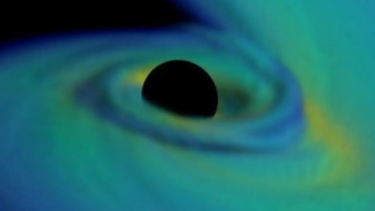 Un agujero negro y una estrella de neutrones colisionando, simulaci&oacute;n. / ScienceAlert.