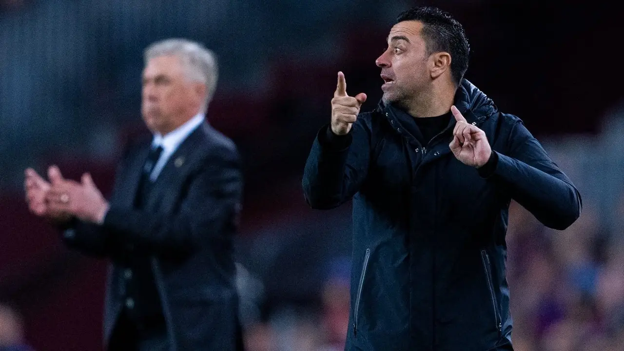 Xavi Hern&aacute;ndez y Carlo Ancelotti en un Cl&aacute;sico. / @Twitter