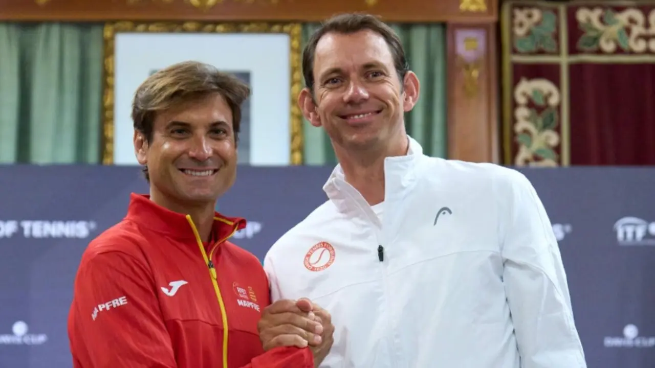 David Ferrer y Frederik Nielsen. /  @daviscup