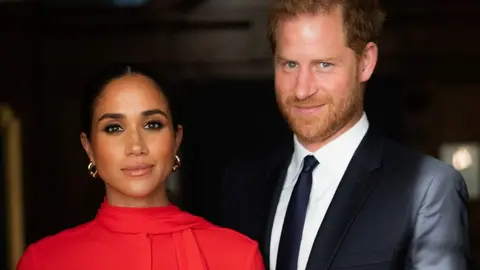 Meghan Markle y el pr&iacute;ncipe Harry, duques de Sussex. / @misanharriman.