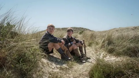 P&oacute;ster de La isla de Amrum. / RR SS